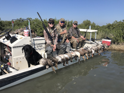 duck hunters on fan boat